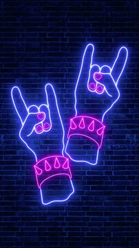 neon lights rock and roll hands gesture sign on brick wall animation , metal and rock live music stream,bar and club signboard vertical social media motion background