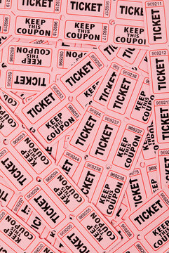 Background of overlapping pink raffle tickets