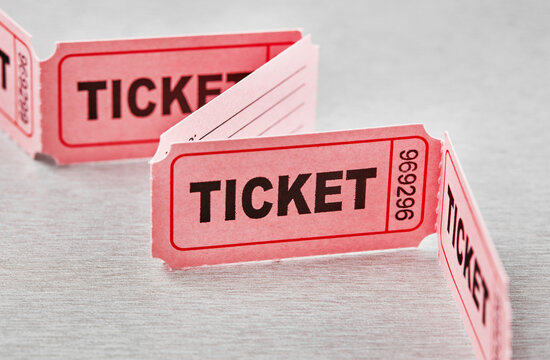 Pink raffle tickets folded into geometric display