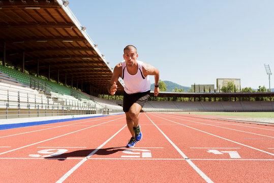 Young sportsman starting running, tratan race