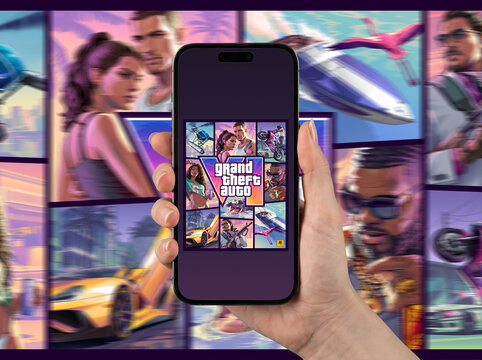 Grand Theft Auto VI cover art displayed on iPhone smartphone screen with game artwork background