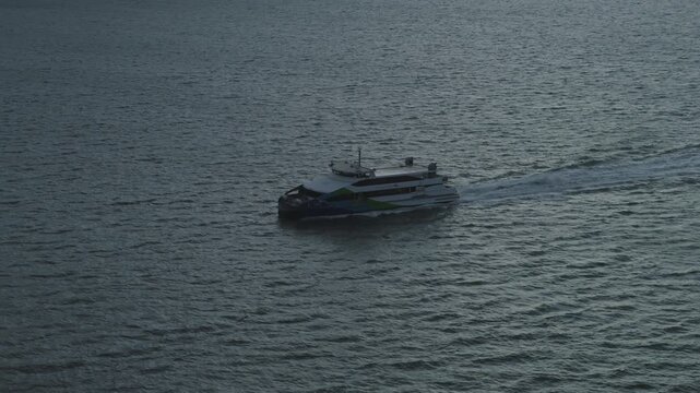 Passenger Ferry Catamaran Crossing San Francisco Bay - Aerial View At Dusk