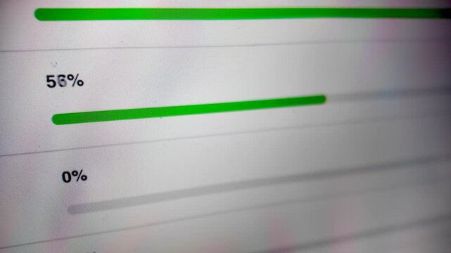 Visualizing the ongoing process of digital file transfers with a dynamic green status bar.