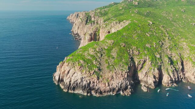 Cinematic Aerial Drone Flight Along Granite Sea Cliffs at Vinh Hy Bay, Ninh Thuan, Vietnam