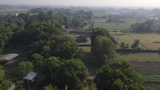 An aerial view of Kedulan Temple, a Hindu archaeological site in Sleman, Yogyakarta. The temple was built around the 8th and 9th centuries during the Ancient Mataram Kingdom.