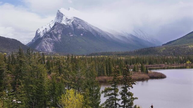 Mount Rundle above a quiet lake near Banff