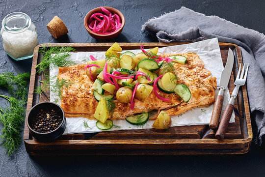 Baked salmon fillet, new potatoes, pickled onion