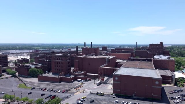 The iconic Anheuser-Busch Budweiser Brewery with its legendary red-brick industrial complex in the Soulard neighborhood of St, Louis, Missouri - forward aerial approach
