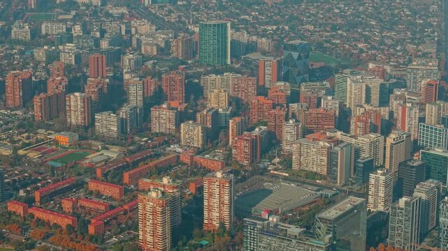 Aerial pan right flying over Las Condes, Santiago, Chile