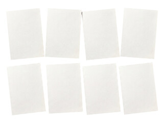 Fototapeta premium Eight blank vertical white paper sheets with slightly irregular edges, precisely arranged in two rows.