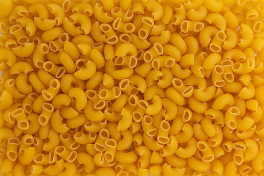 chifferi rigati pasta texture background