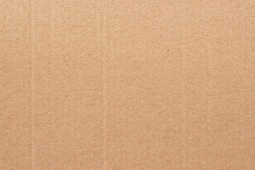 Fototapeta premium Brown cardboard sheet abstract background, texture of recycle paper box in old vintage pattern for design art work.
