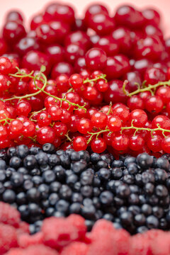 Mix of different ripe tasty berries as background
