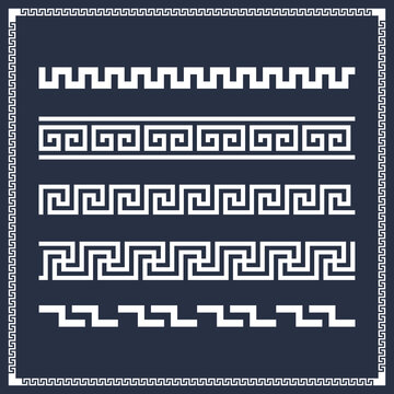 Set of white Greek key border patterns and meander motifs on a navy blue background including various geometric fret designs, square frames, and ancient classic linear ornaments.
