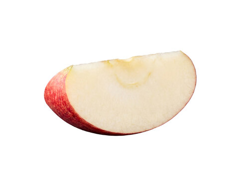 Freshly cut, crisp red apple slice with visible seeds, showing its juicy texture, isolated on transparent background.