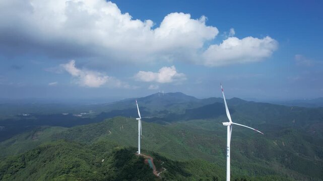 4K Aerial Drone Footage of Wind Turbines on Mountain Top