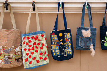 Eco conscious fashion upcycled denim bags handmade craft. © sav_an_dreas