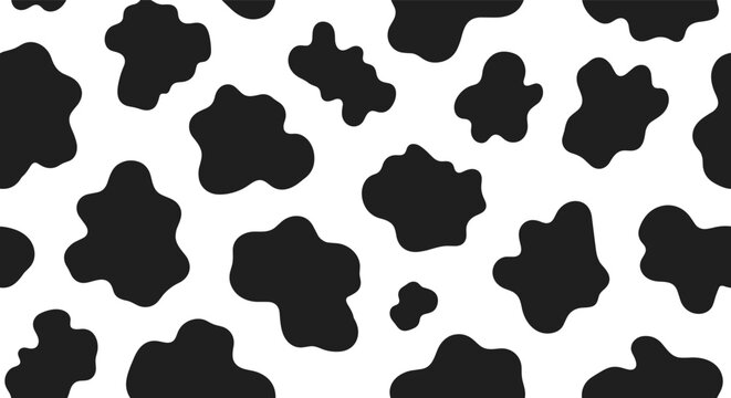 Seamless cow hide print pattern with organic black spots on a white background for textile and wallpaper design.