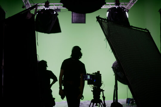 Film set, monitors and modern shooting equipment. Film crew, lighting devices, monitors, playbacks - filming equipment and a team of specialists in filming movies, advertising and TV series