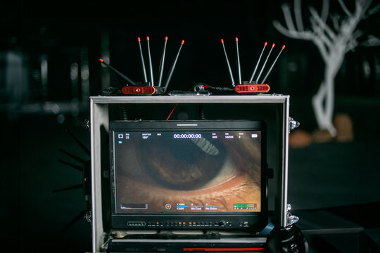 Film set, monitors and modern shooting equipment. Film crew, lighting devices, monitors, playbacks - filming equipment and a team of specialists in filming movies, advertising and TV series