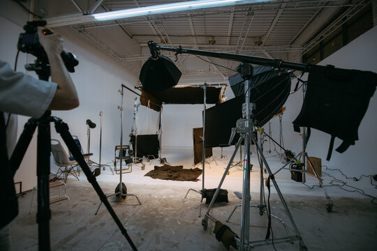 Film set, monitors and modern shooting equipment. Film crew, lighting devices, monitors, playbacks - filming equipment and a team of specialists in filming movies, advertising and TV series