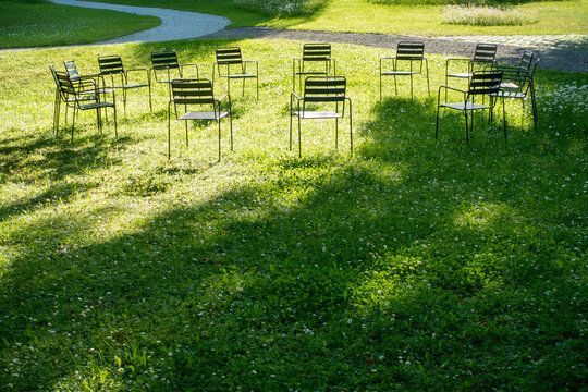 Circle of chairs in the park