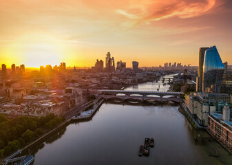 Fototapeta premium Aerial summer sunrise view of the City of London skyline