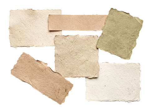 Artful composition of layered textured handmade paper pieces with natural organic edges on a transparent background.