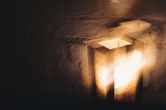 Copper & Cadence &mdash; Cinematic abstract of a cozy late-night recording studio workspace, featuring warm ambient light dragging across raw jute textures, instrument geometry, and fluid intentional camera