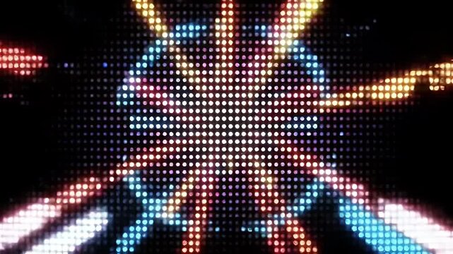 Abstract pattern of colorful lights in a dark background.