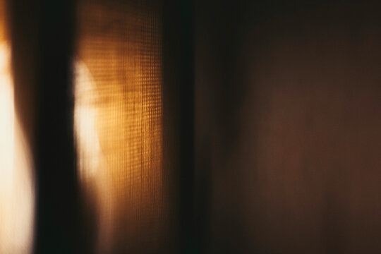 Copper & Cadence &mdash; Cinematic abstract of a cozy late-night recording studio workspace, featuring warm ambient light dragging across raw jute textures, instrument geometry, and fluid intentional camera