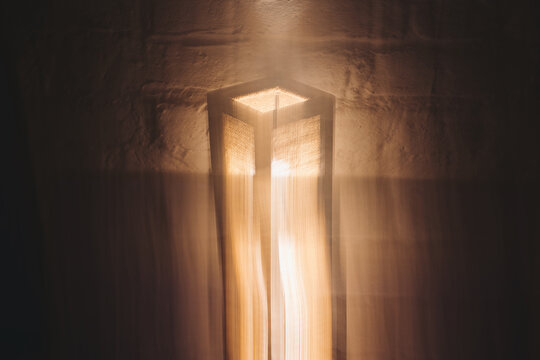 Copper & Cadence &mdash; Cinematic abstract of a cozy late-night recording studio workspace, featuring warm ambient light dragging across raw jute textures, instrument geometry, and fluid intentional camera