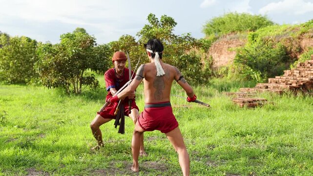 Traditional Thai Martial Arts Sword Fighting Between Two Ancient Warriors