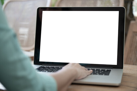 blank monitor desktop screen or white screen computer with back view mock up image of women using laptop computer.