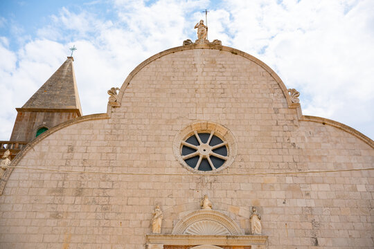 facade of Cathedral of the Assumption of Mary and bell tower in Osor, Croatia