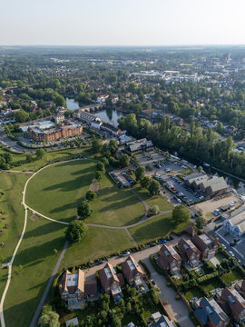Aerial view of luxury new build homes situated near a lush green park and the River Thames in Maidenhead, England, United Kingdom.