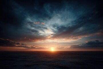 Fototapeta premium Stunning dramatic sunset over a calm ocean horizon.