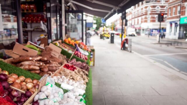 LONDON - timelapse of busy high street with motion blur and market stall