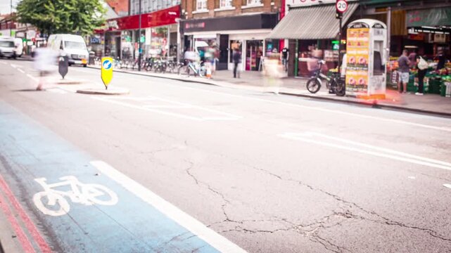 LONDON - timelapse of busy high street with motion blur and cycle lane