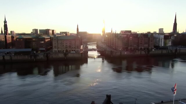 Aerial view of Hamburg's Speicherstadt district at sunrise.