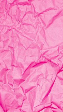 Vertical Abstract Animation of Crumpled Bright Pink Paper Texture Background