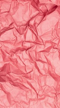 Vertical Abstract Animation of Crumpled Coral Red Paper Texture Background