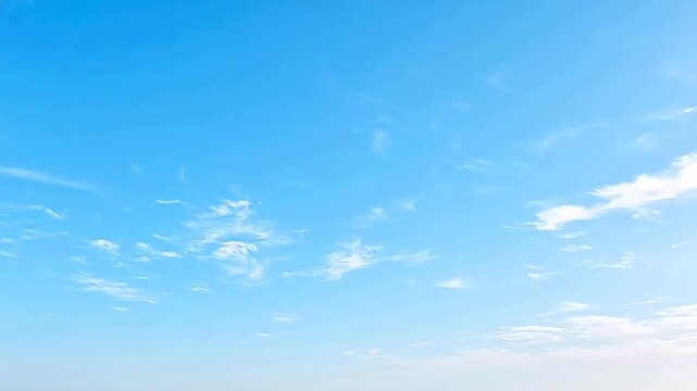 Blue sky with wispy clouds
