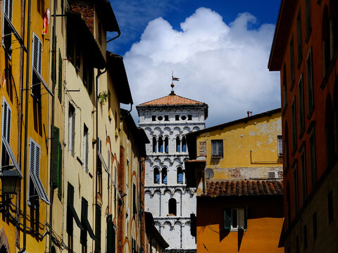 Lucca historical center with medieval bell tower at the end