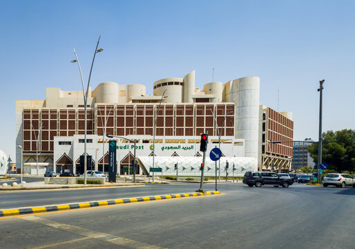 Scenic street view of the Saudi Post SPL headquarters building under a clear blue sky in Riyadh Saudi Arabia
