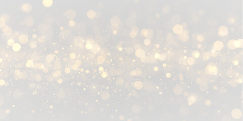 Soft golden bokeh lights on a light gray background creating a dreamy and elegant atmosphere suitable for various design projects and festive occasions © newname02