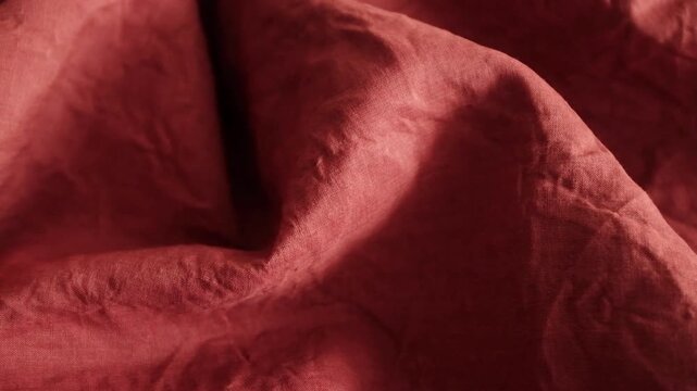 Premium terracotta red linen or hemp fabric texture. Rustic wrinkles, natural organic pattern, and rich earthy red tones. Ideal for abstract textile design, slow fashion concepts, eco-friendly apparel