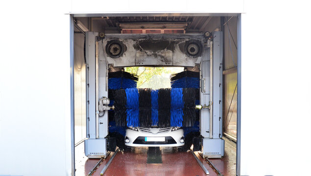 car in a car wash for cleaning a vehicle