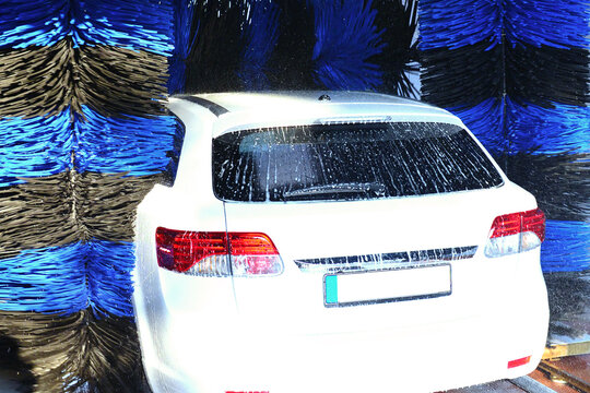 car in a car wash for cleaning a vehicle