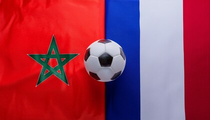 Naklejka premium soccer ball placing between Morocco flag and France flag
